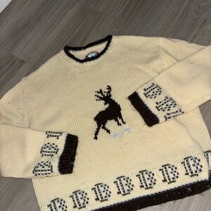 Elegant Cream Sweater with Deer Motif